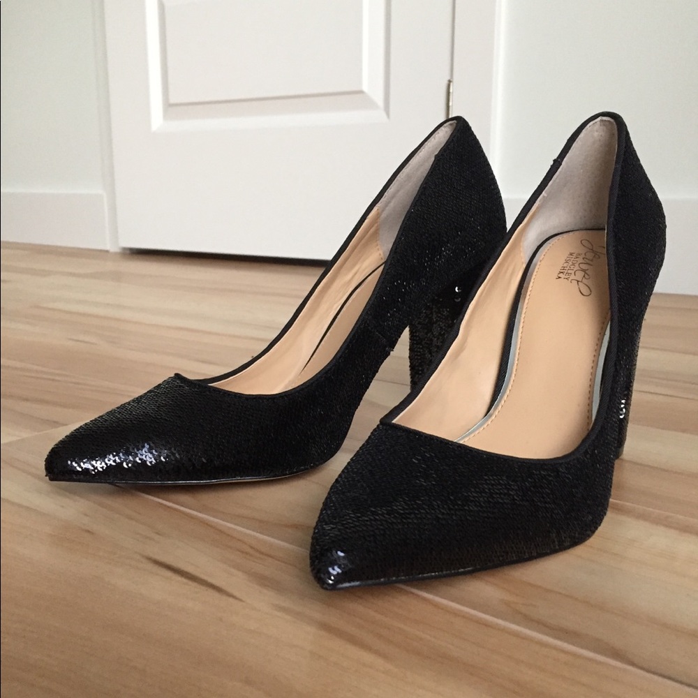 Jewel Badgley Mischka leather high heels.